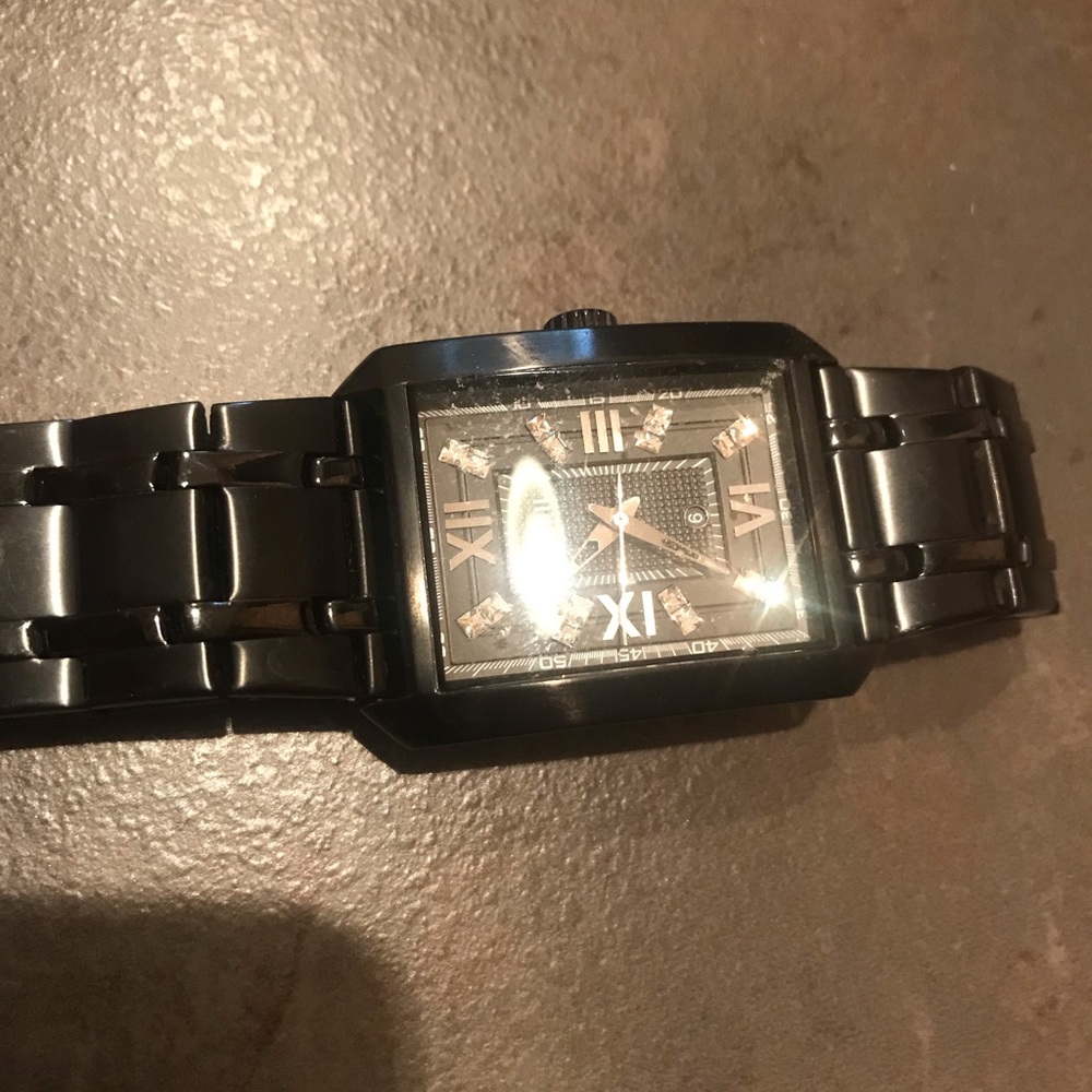 Men’s fossil watch.